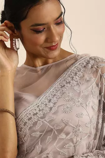 Off white off white floral beads and stones net saree