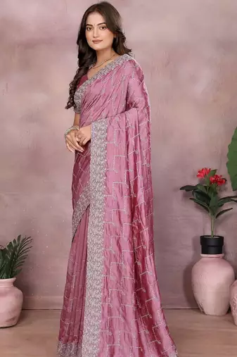 Pink embroidered saree with matching blouse piece