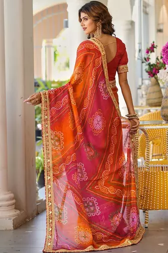 Red printed lace border bandhani sarees with contrast blouse piece
