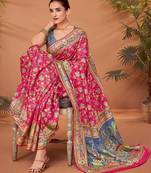 Pink ethnic motifs printed festive wear saree with matching unstitched blouse