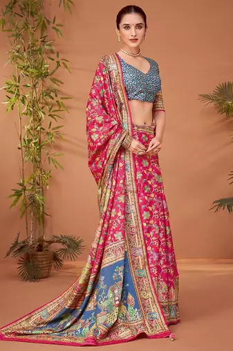 Pink ethnic motifs printed festive wear saree with matching unstitched blouse