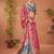 Pink ethnic motifs printed festive wear saree with matching unstitched blouse