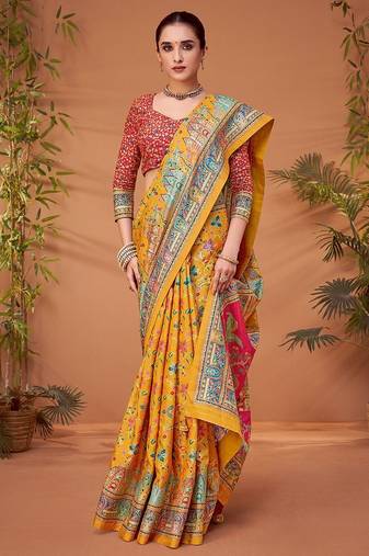 Yellow women ethnic motifs printed viscose rayon saree