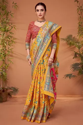 Yellow women ethnic motifs printed viscose rayon saree