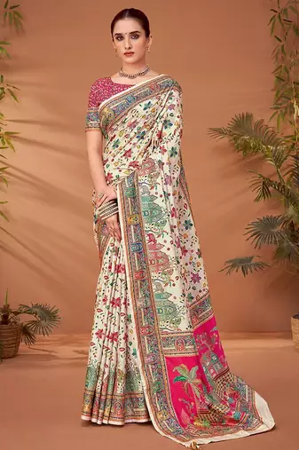 Cream ethnic motifs printed saree