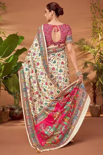 Cream ethnic motifs printed saree