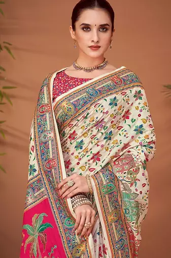 Cream ethnic motifs printed saree