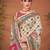 Cream ethnic motifs printed saree