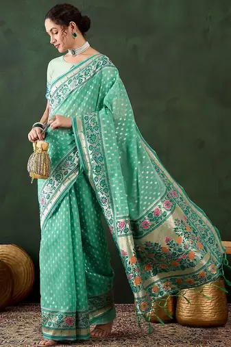 Sea green woven design banarasi saree with blouse piece