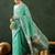 Sea green woven design banarasi saree with blouse piece