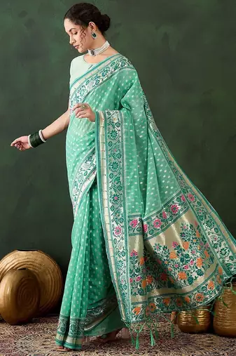 Sea green woven design banarasi saree with blouse piece
