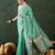 Sea green woven design banarasi saree with blouse piece