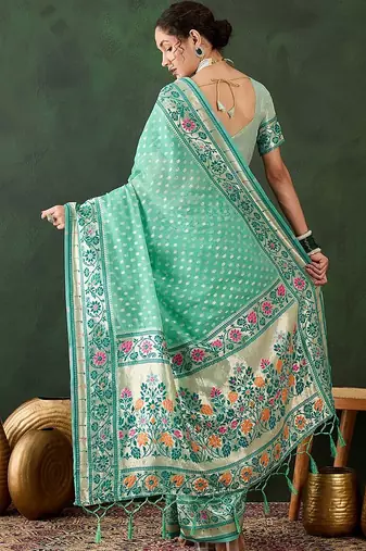 Sea green woven design banarasi saree with blouse piece