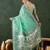 Sea green woven design banarasi saree with blouse piece