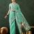 Sea green woven design banarasi saree with blouse piece