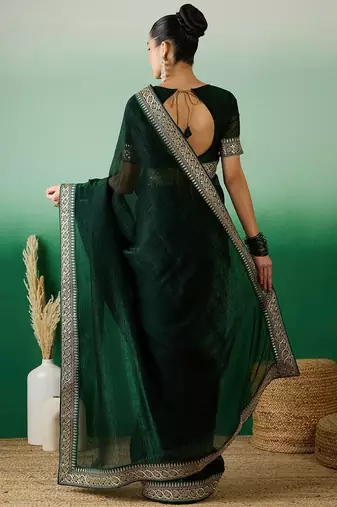 Green zari embroidered sequinned border saree with blouse
