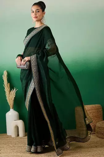 Green zari embroidered sequinned border saree with blouse