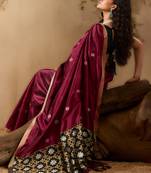 Maroon ethnic motifs woven design saree with unstitched blouse