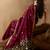 Maroon ethnic motifs woven design saree with unstitched blouse