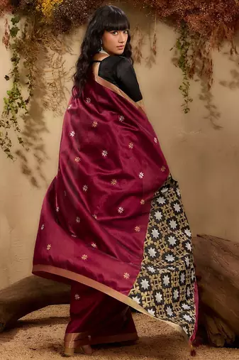 Maroon ethnic motifs woven design saree with unstitched blouse