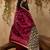 Maroon ethnic motifs woven design saree with unstitched blouse