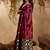 Maroon ethnic motifs woven design saree with unstitched blouse