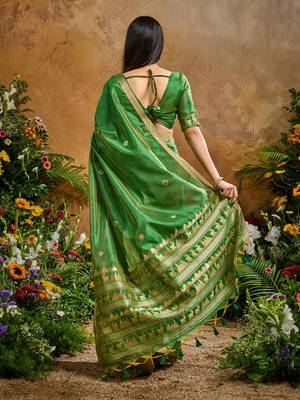 Green ethnic motifs woven design saree with unstitched blouse 4
