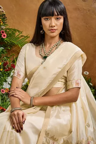 Cream ethnic motifs woven design saree with unstitched blouse