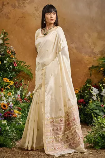 Cream ethnic motifs woven design saree with unstitched blouse