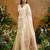 Cream ethnic motifs woven design saree with unstitched blouse