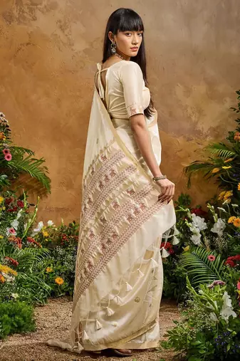 Cream ethnic motifs woven design saree with unstitched blouse