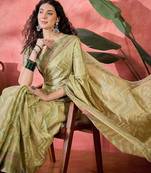 Green ethnic motifs woven design zari detail saree with unstitched blouse