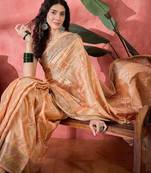 Peach ethnic motifs woven design zari bandhani saree