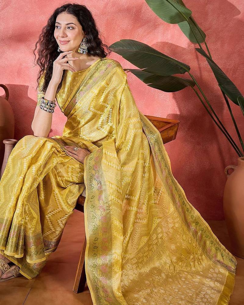 Yellow ethnic motifs woven design zari border saree with unstitched blouse