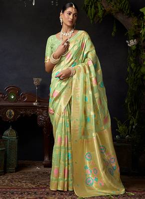 Sage green organza khadi saree with elegant jhallar festive wear saree 1