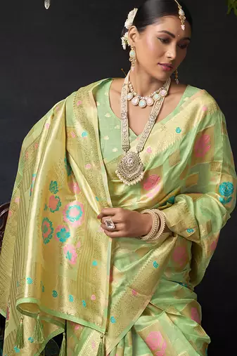 Sage green organza khadi saree with elegant jhallar festive wear saree