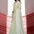 Green shimmer look with embellished border saree with unstitched blouse