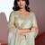 Green shimmer look with embellished border saree with unstitched blouse
