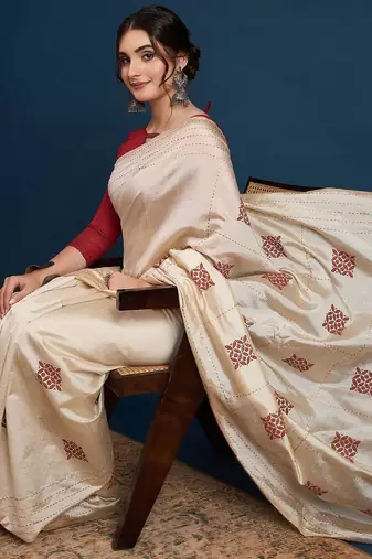 Cream printed party wear saree with unstitched blouse
