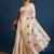 Cream printed party wear saree with unstitched blouse