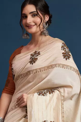 Cream floral printed with embroidered border saree with unstitched blouse