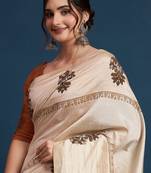 Cream floral printed with embroidered border saree with unstitched blouse