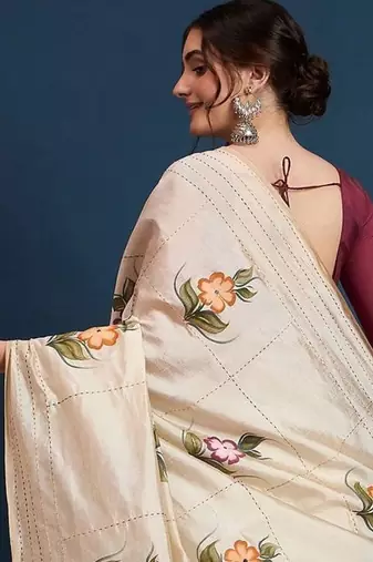Cream printed party wear saree with unstitched blouse
