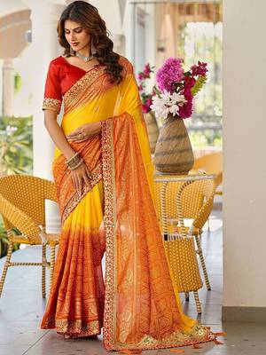Yellow bandhani printed lace border sarees with contrast blouse piece 1