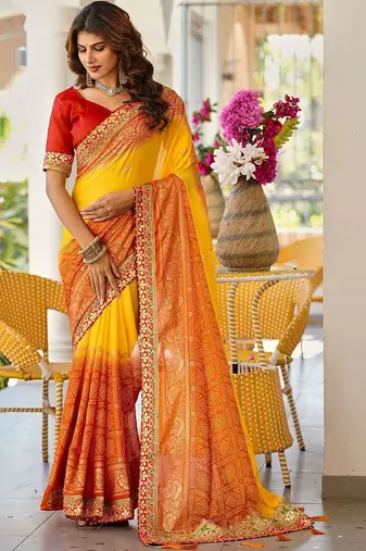 Yellow bandhani printed lace border sarees with contrast blouse piece