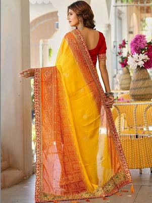 Yellow bandhani printed lace border sarees with contrast blouse piece 2