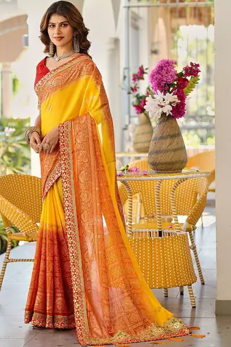 Yellow bandhani printed lace border sarees with contrast blouse piece