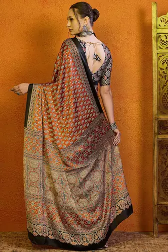 Orange women rust satin  block printed saree with blouse piece