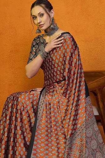 Orange women rust satin  block printed saree with blouse piece