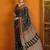 Black block printed satin saree with blouse